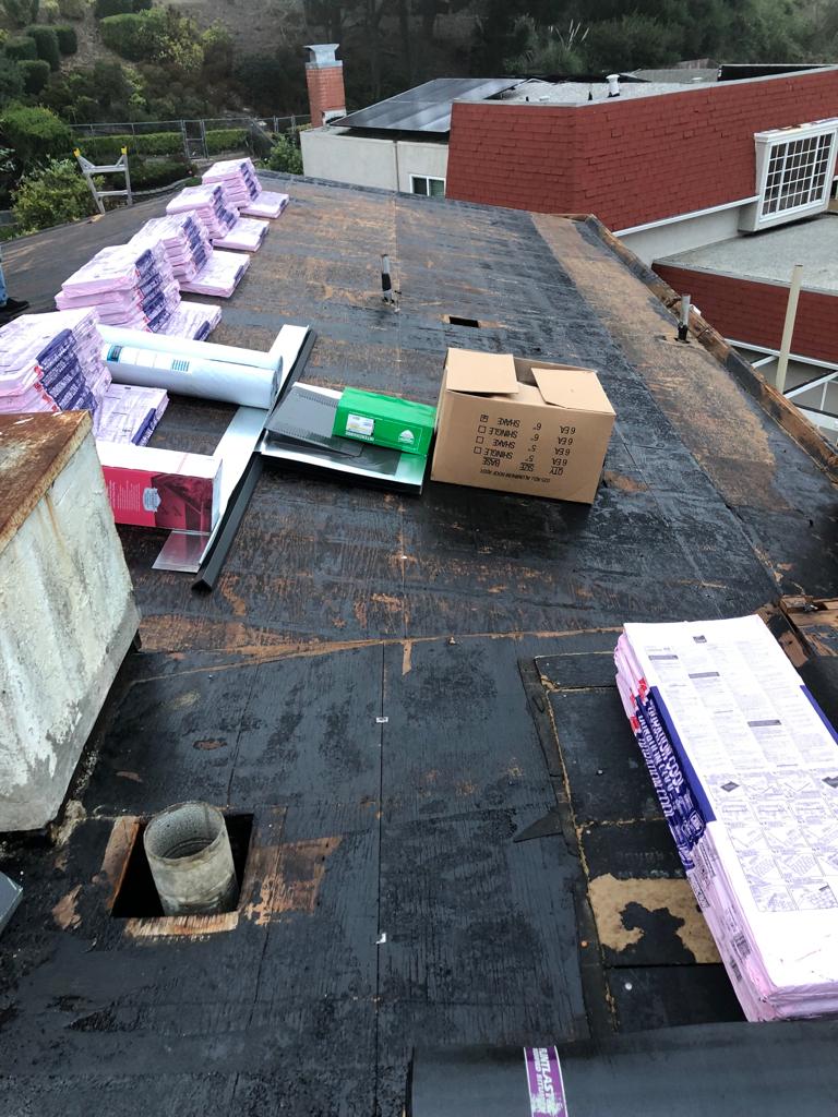 During new roof Installment : Flat _ Pitched Roof_ Shingles_ Owens Corning_ Color Night Sky_ Flat Roof_ Plolyfresko Title 24 Torch Down