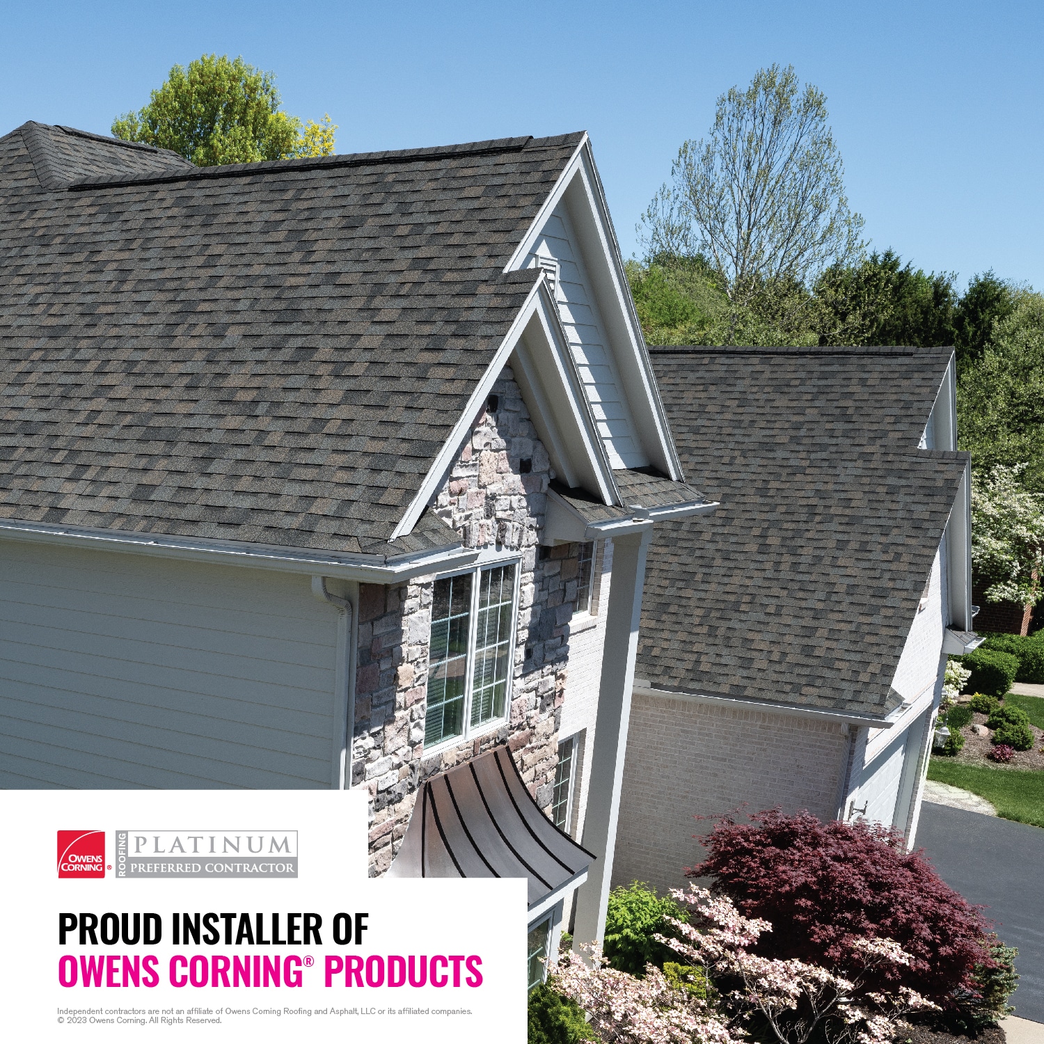 Aerial view of a suburban house with Owens Corning roofing and advertisement.