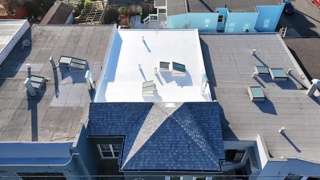Cool Roofing – After Renovation with White Reflective Coating and Skylights