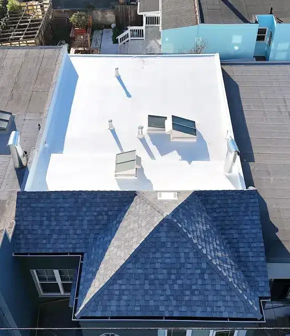 Cool Roofing – After Renovation with White Reflective Coating and Skylights