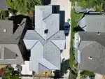 New light gray multi-gable asphalt shingle roof with clean symmetry