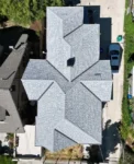New light gray multi-gable asphalt shingle roof with clean symmetry