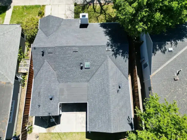 Aerial view of new dark gray asphalt shingle roof