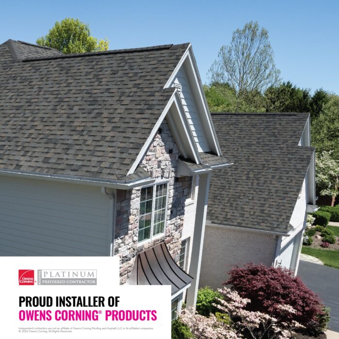 Aerial view of a suburban house with Owens Corning roofing and advertisement