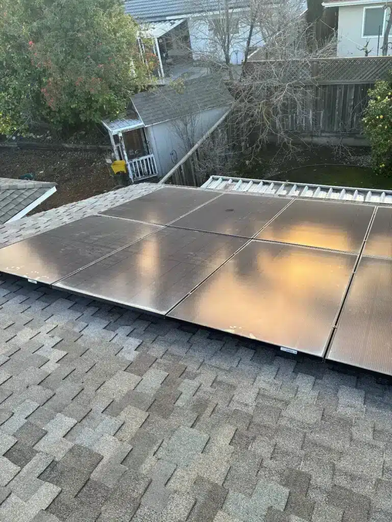 Solar panels reinstalled on the repaired Presidential-style asphalt shingle roof on Como Lane, San Jose