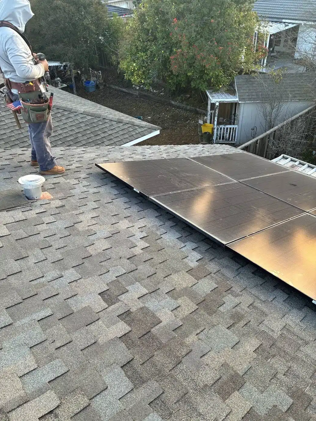 Reinstalled solar array on the repaired Presidential-style shingle roof at Como Lane, San Jose
