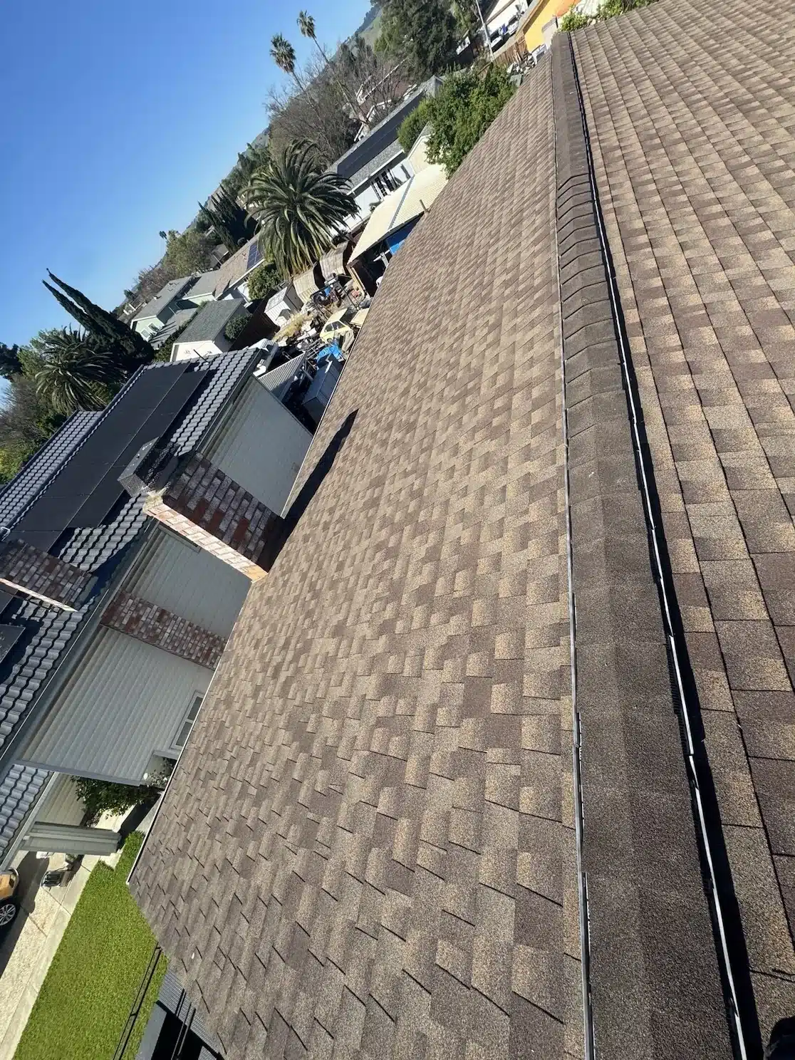 Aging 11-year-old shingle roof before the leak-driven reshingle at 33940 Macmillan Way, Fremont CA