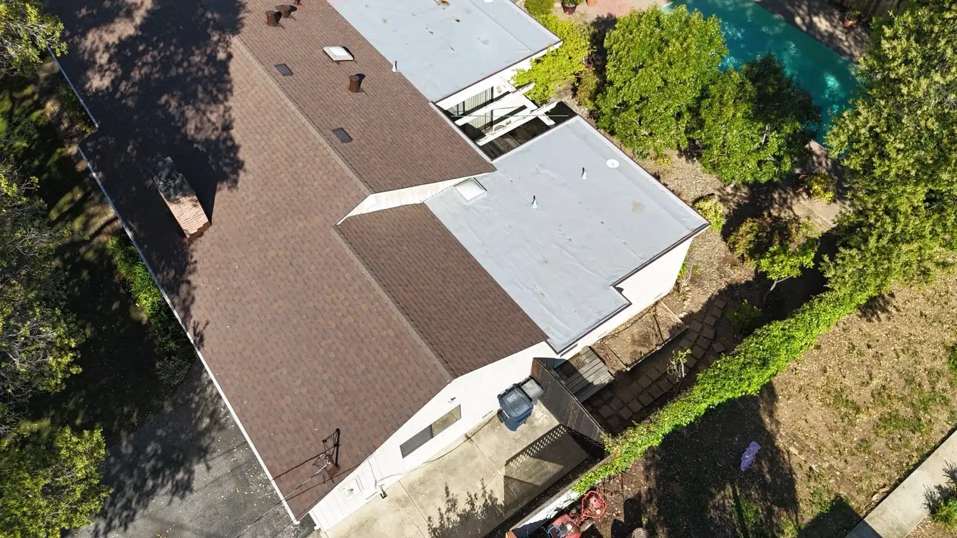 https://lifetimeroofingrenovation.com/los-altos-roof-replacement-chan/ Los Altos Roof Replacement: How an Insurance Letter Turned Into a $48,000 Roof Upgrade Completed Los Altos roof replacement at 341 Yerba Buena Avenue — new architectural shingles on steep-slope section and fresh flat roof membrane on extension, aerial drone view