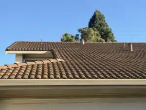 Repaired concrete tile roof over the garage after tile reset in Fremont CA