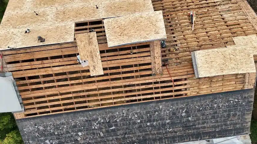 Aerial view of a full tear-off to the framing with new plywood decking during a Foster City re-roof