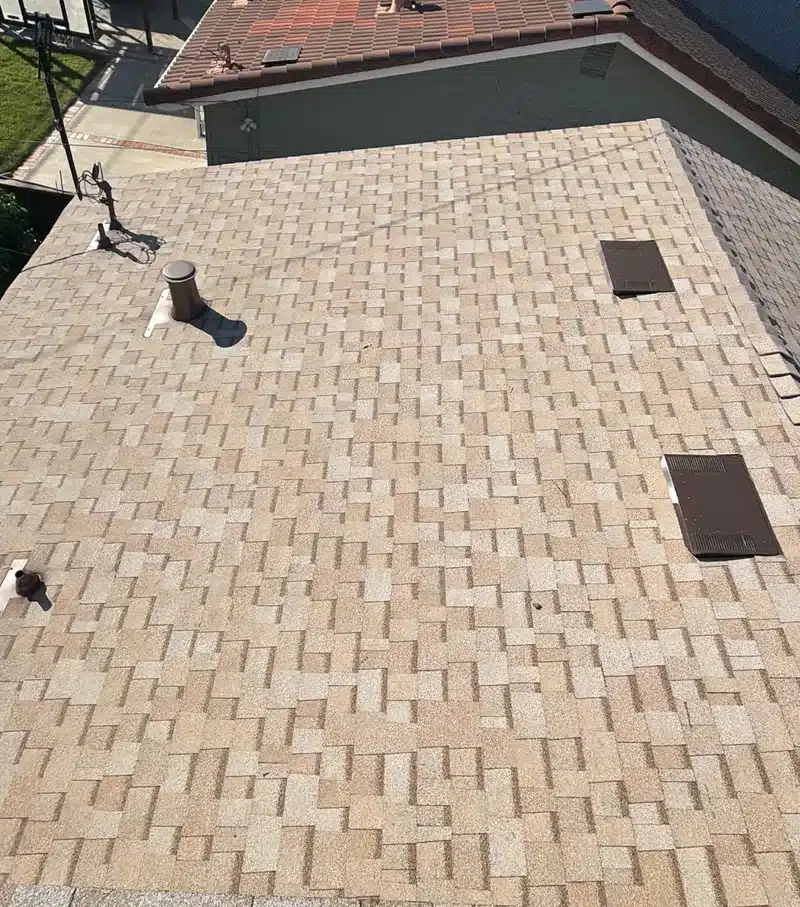 Newly installed Owens Corning architectural asphalt shingles with new vents on the South San Jose home