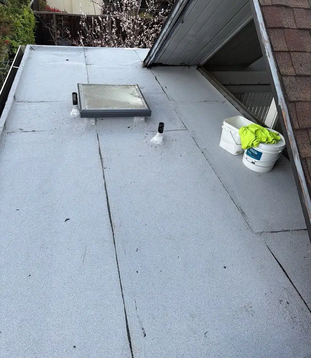 New skylight on a newly framed curb with cap sheet run up the sides, Sunnyvale CA