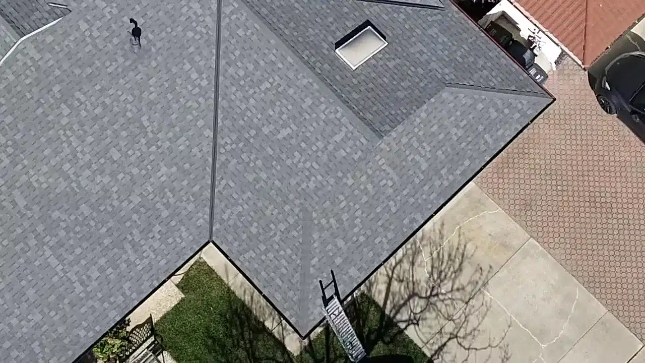 Finished Mountainside cool-roof shingles around a skylight in Livermore, CA 94550