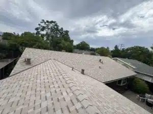 Completed roof replacement on a San Jose ranch home showing clean hip and ridge lines in Owens Corning Duration COOL Amber shingles