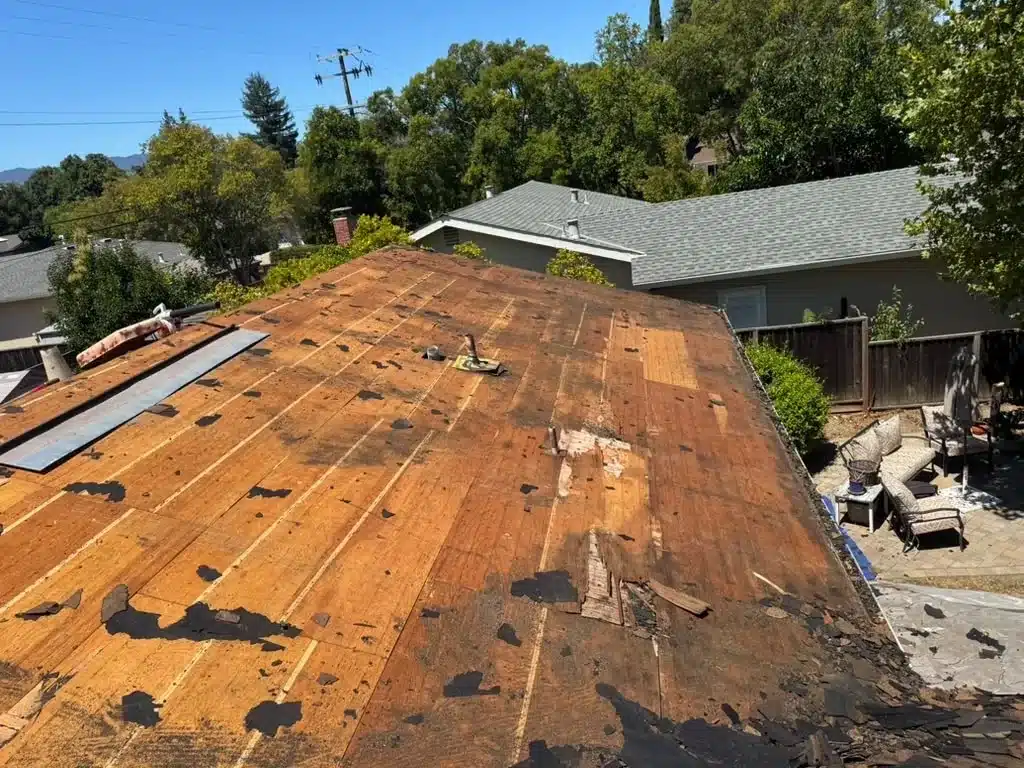San Jose roof stripped to bare decking after a complete three-layer tear-off