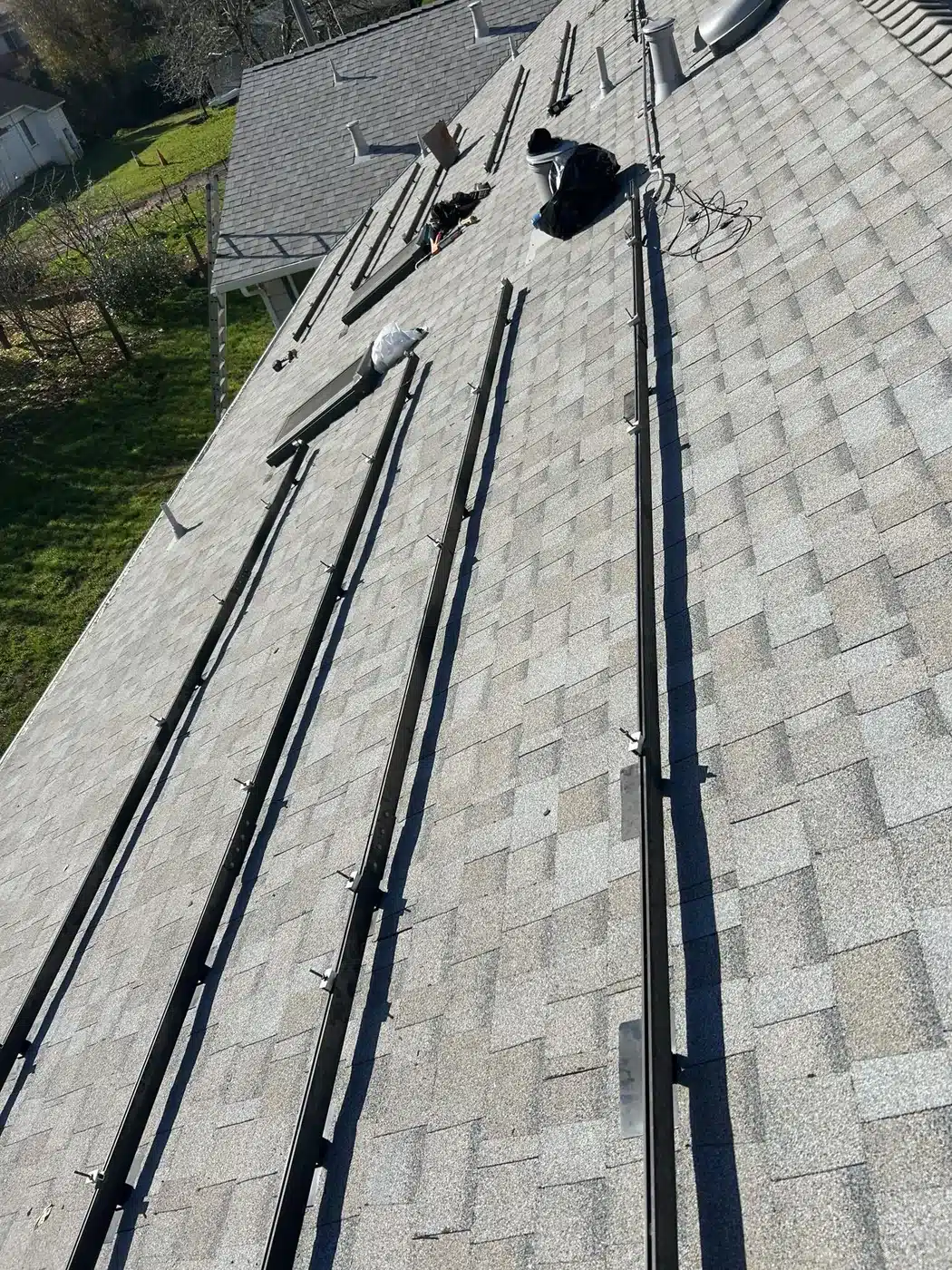 Solar mounting rails reinstalled on the new shingle roof in Castro Valley