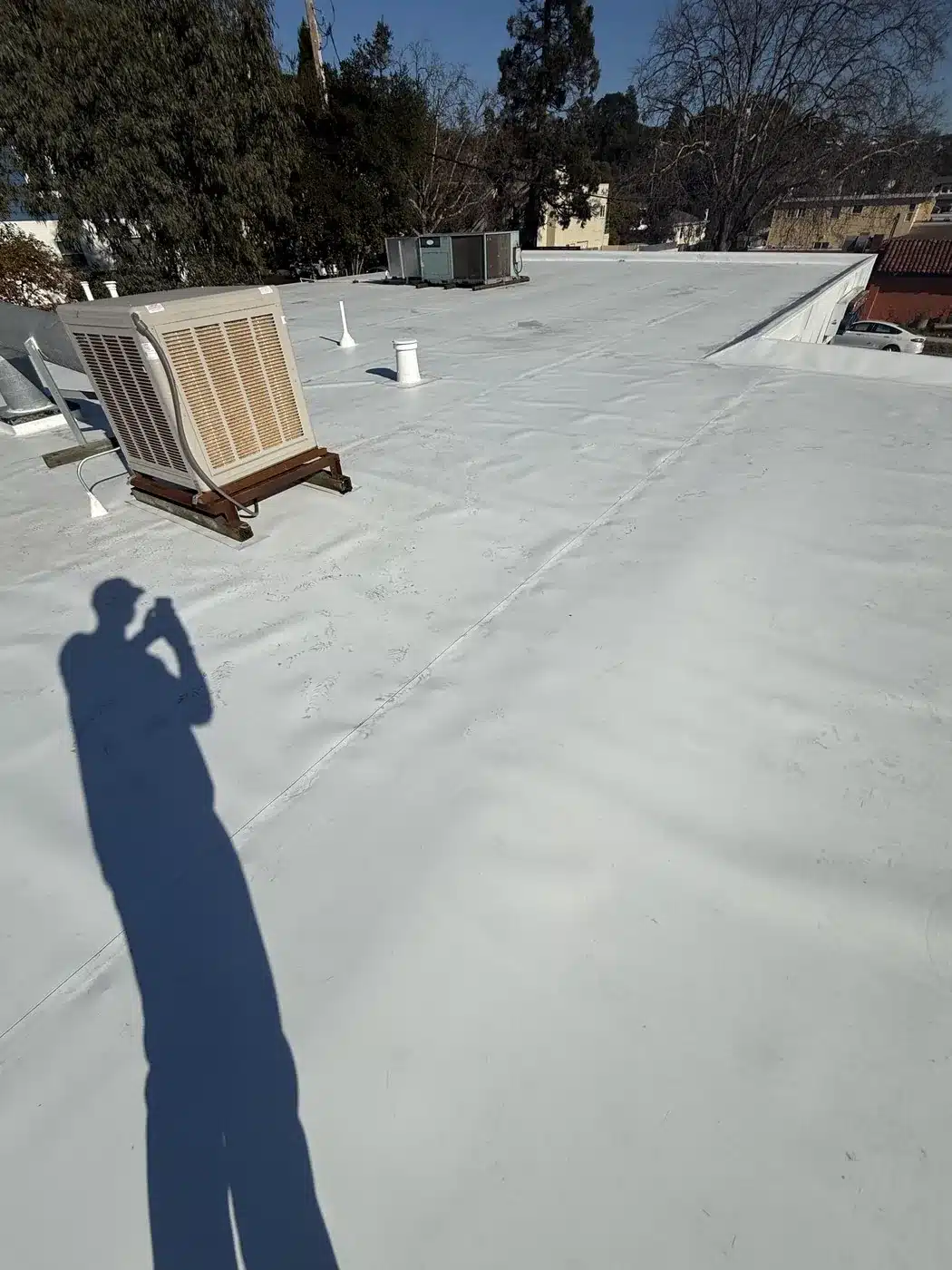 Completed white membrane flat roof with rooftop equipment in San Rafael