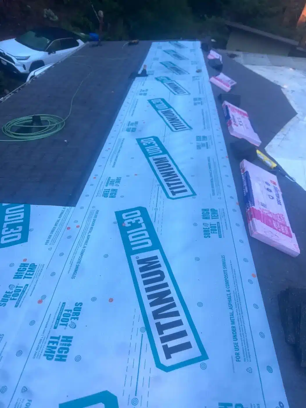 Titanium UDL30 synthetic underlayment on a Felton shingle roof before shingles