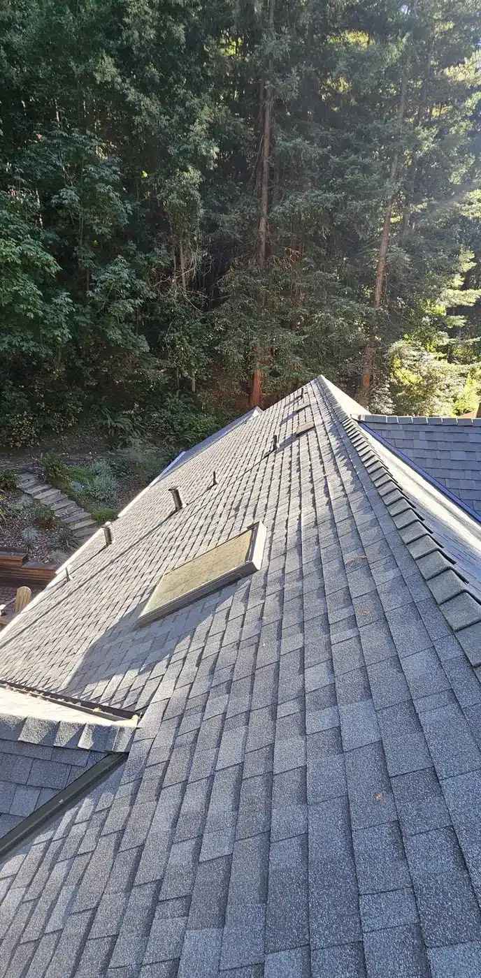 Finished shingle roof with dormers on a mountain home in Felton, CA