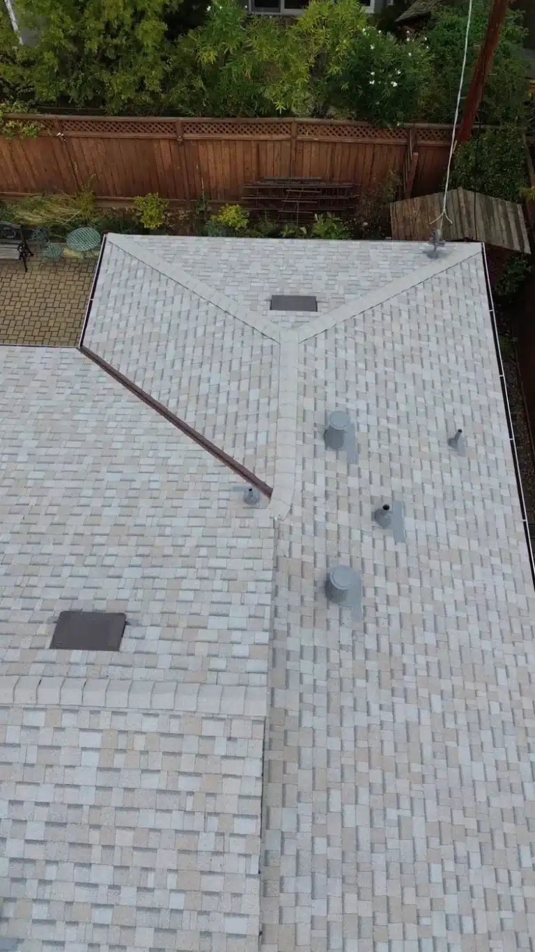 Finished Owens Corning Oyster Shell cool roof from above after a shingle reroof in Mountain View, CA