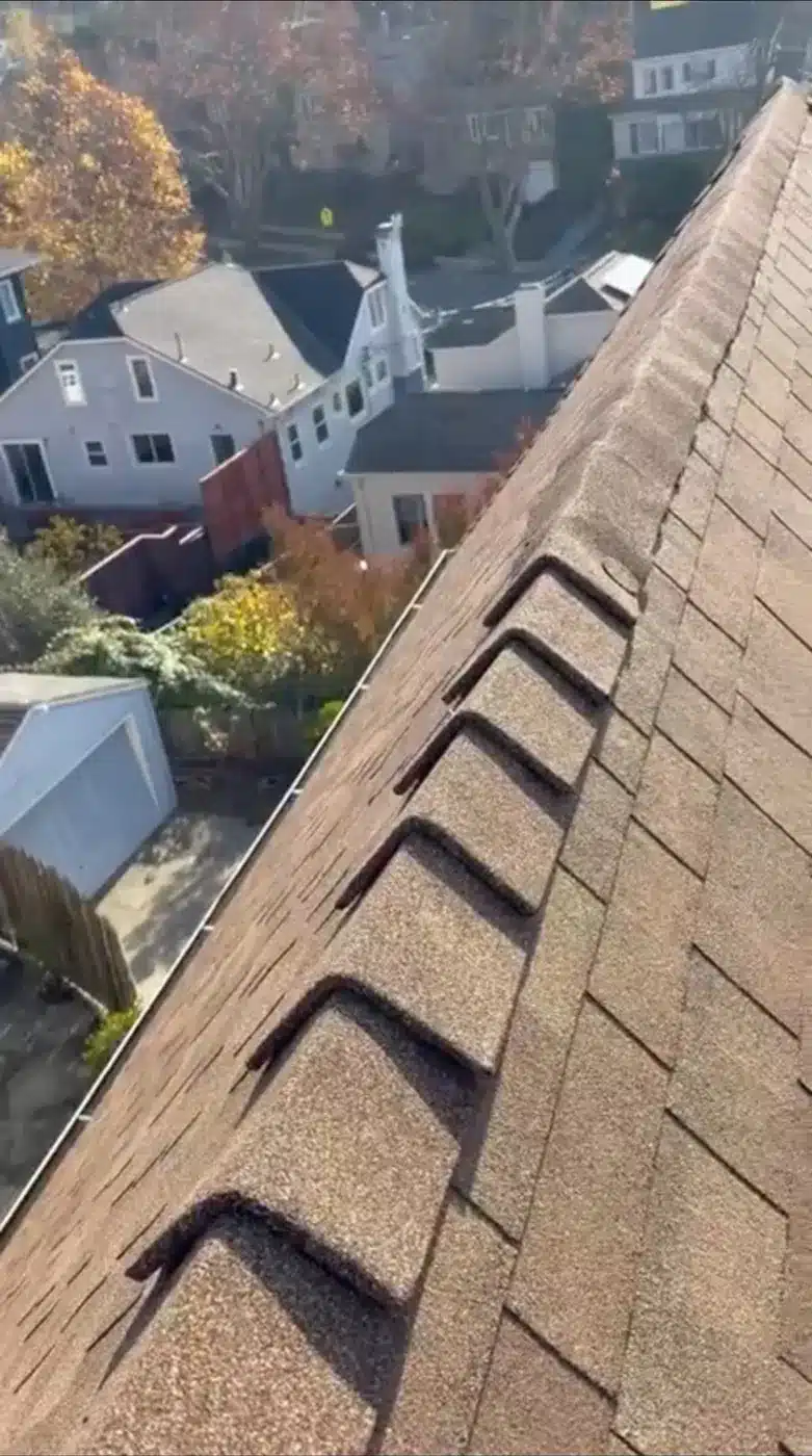 Finished Owens Corning Mojave shingle ridge line after a roof replacement in Piedmont, CA