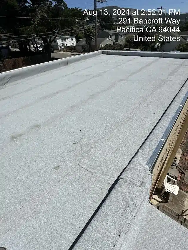 New flat roof membrane with fresh edge metal on Bancroft Way in Pacifica