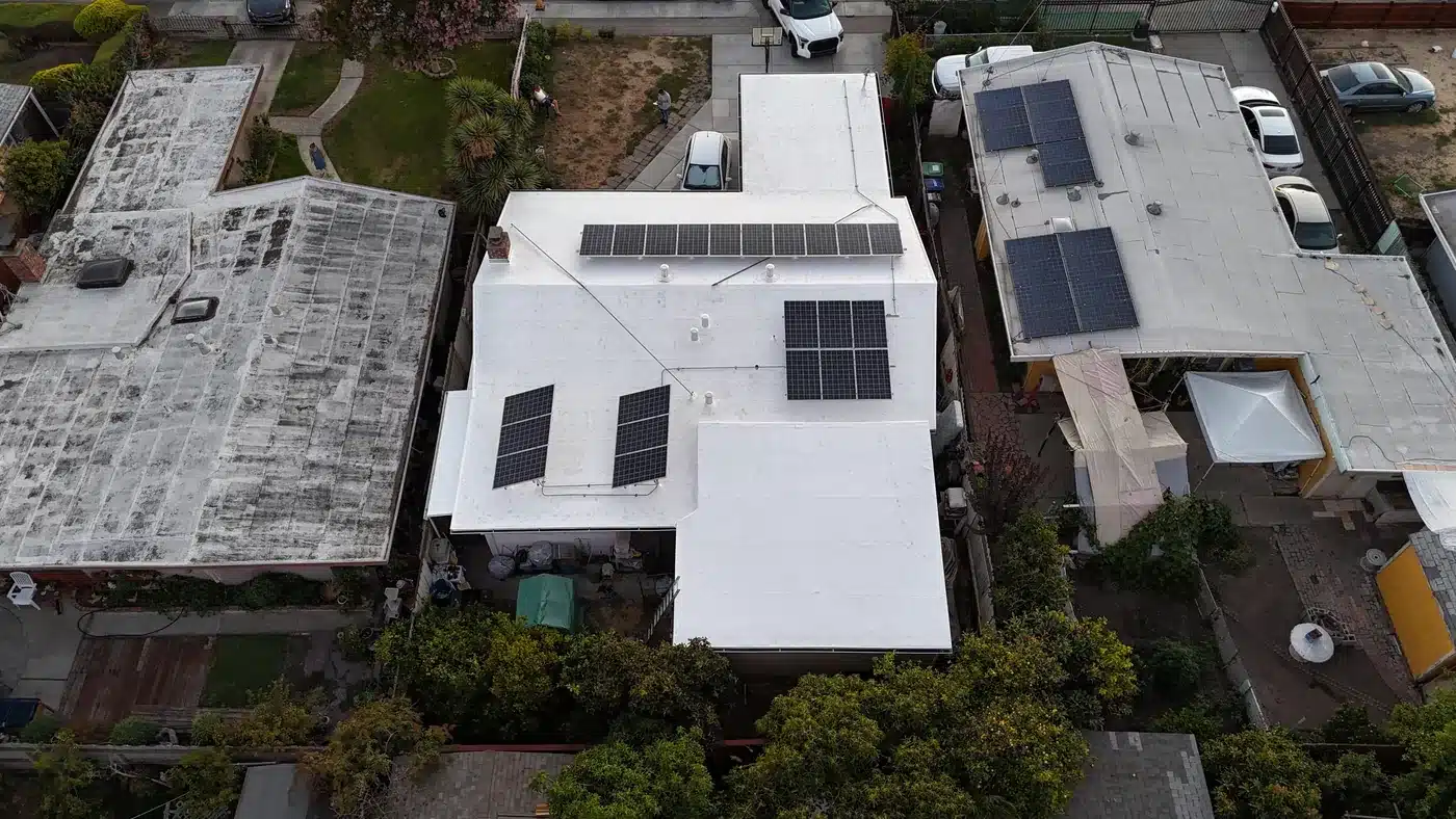 Completed flat roof with solar panels reinstalled on Ormond Avenue in Hayward