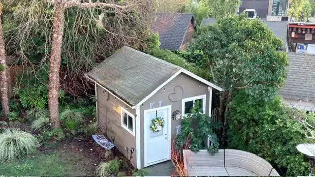 Backyard studio with its new shingle roof after the Mill Valley roof replacement