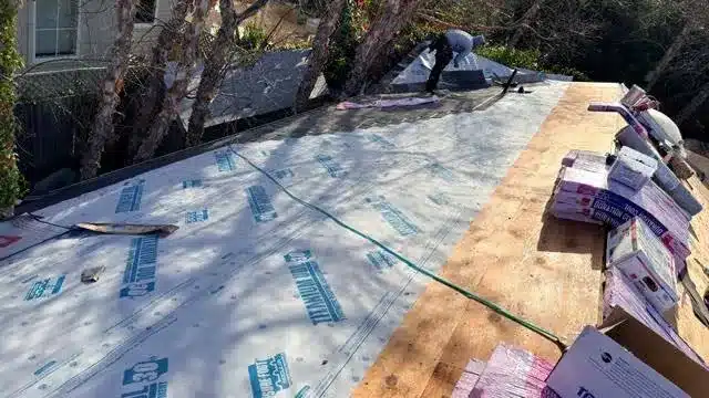 Double layer of synthetic underlayment on a low-slope roof section in Mill Valley, CA