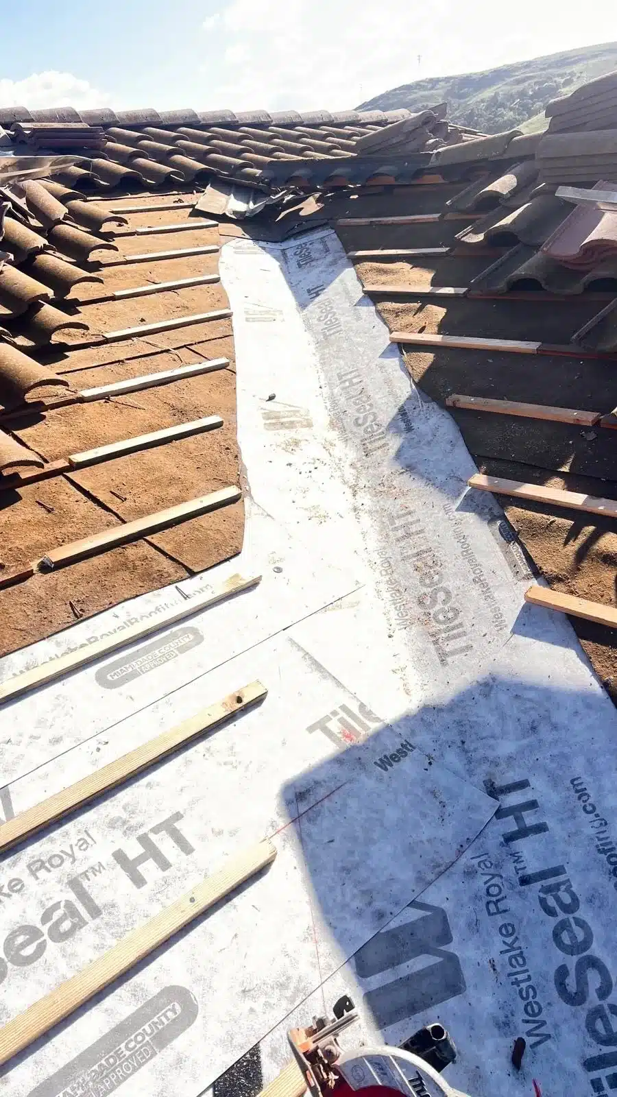 New high-temperature underlayment carried up to the ridge on a Morgan Hill tile roof