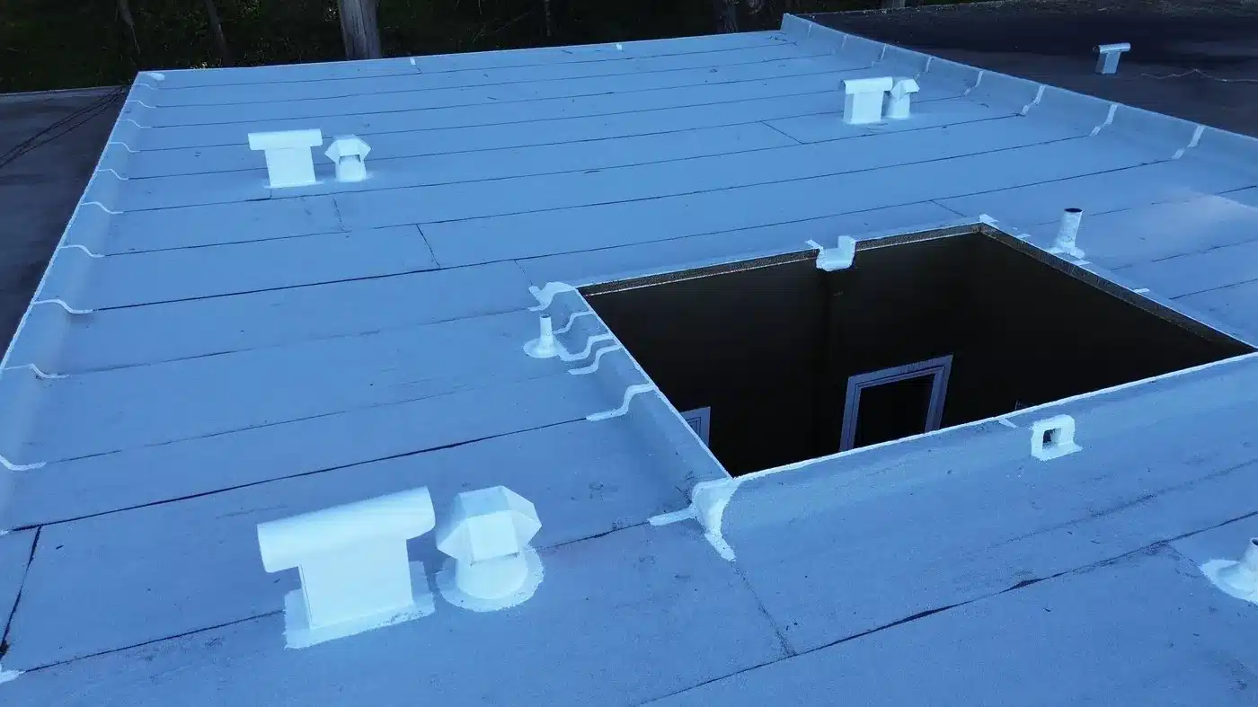New flat roof with sealed penetrations around the lightwell on Templeton Avenue in Daly City