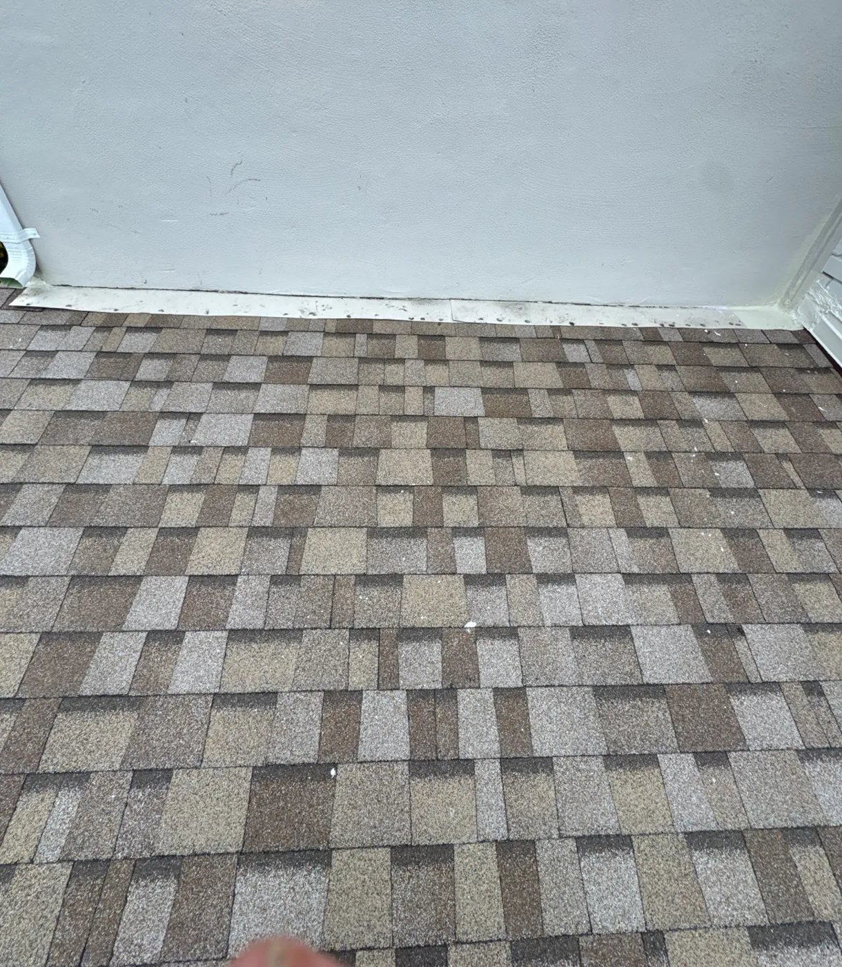 Finished cool-roof shingle field running up to the freshly flashed chimney in Palo Alto, CA 94306