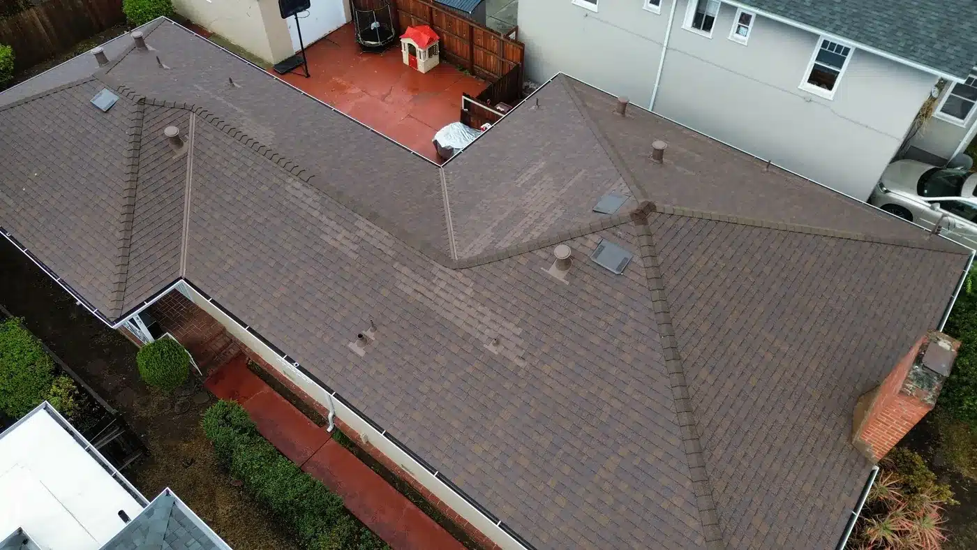 Aerial view of a new shingle roof after replacement on 61st Avenue in East Oakland