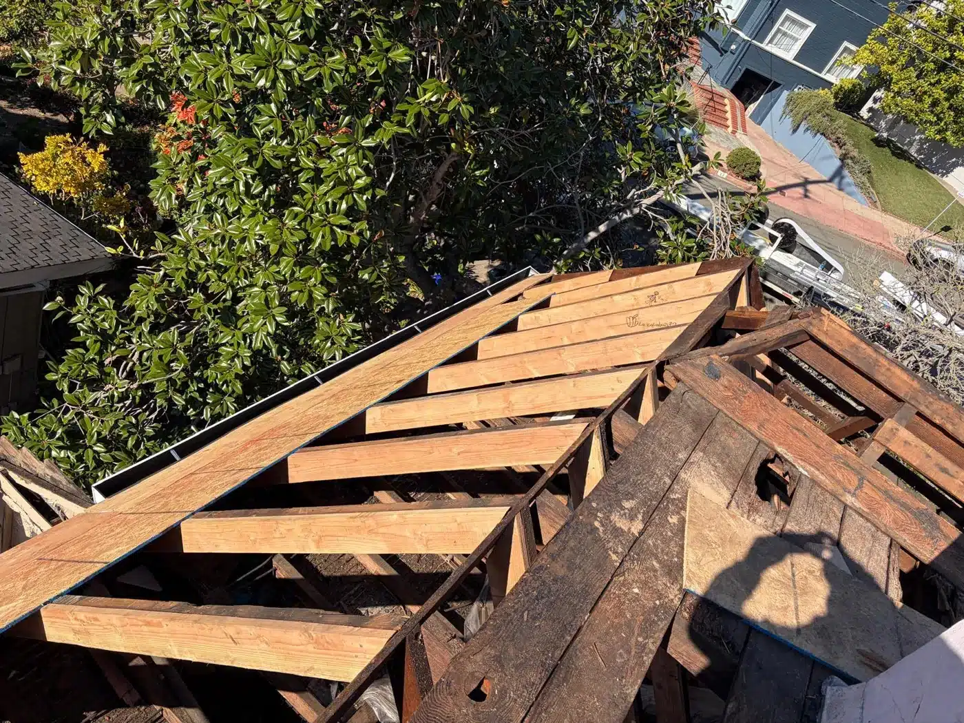 New sister rafters installed alongside the original roof framing in Piedmont, CA