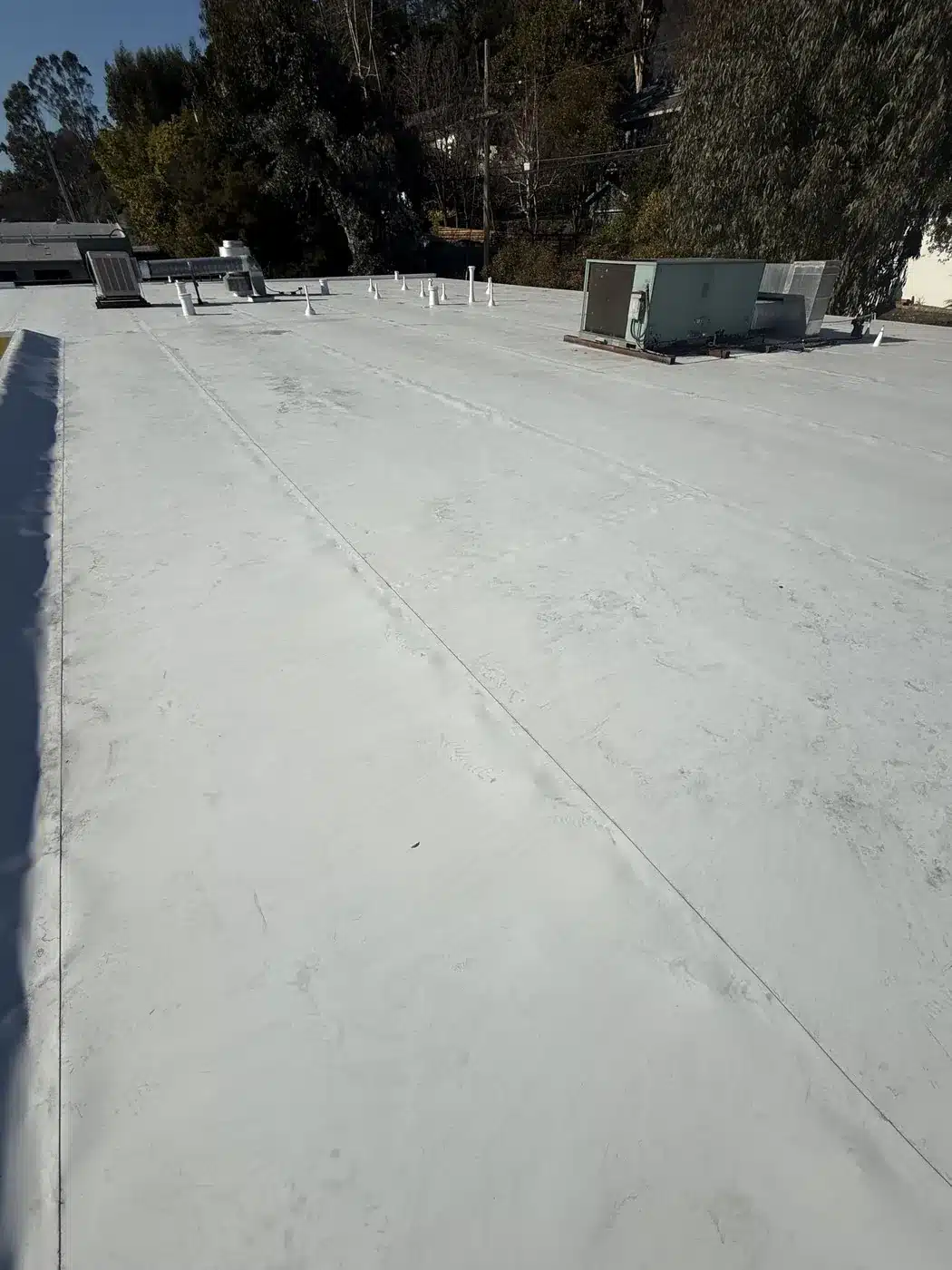 New reflective white membrane flat roof completed on 4th Street in San Rafael