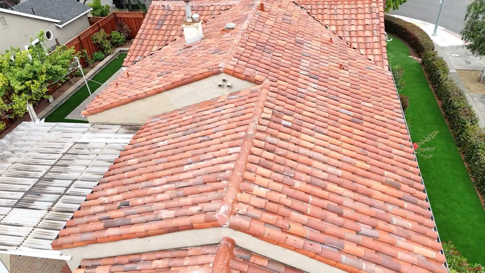 Completed two-piece clay tile roof seen from above after the relay at 1402 Clarita Avenue, San Jose CA