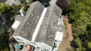 Aerial view of a re-laid concrete tile roof on a townhome building in a Vallejo, CA HOA community