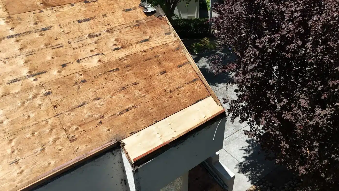 Roof deck exposed after old underlayment removal on a Vallejo townhome tile roof