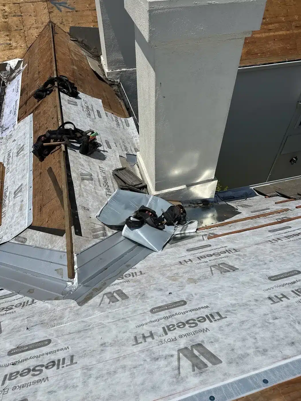Owens Corning TileSeal HT self-adhered underlayment being installed under tile on a Vallejo roof