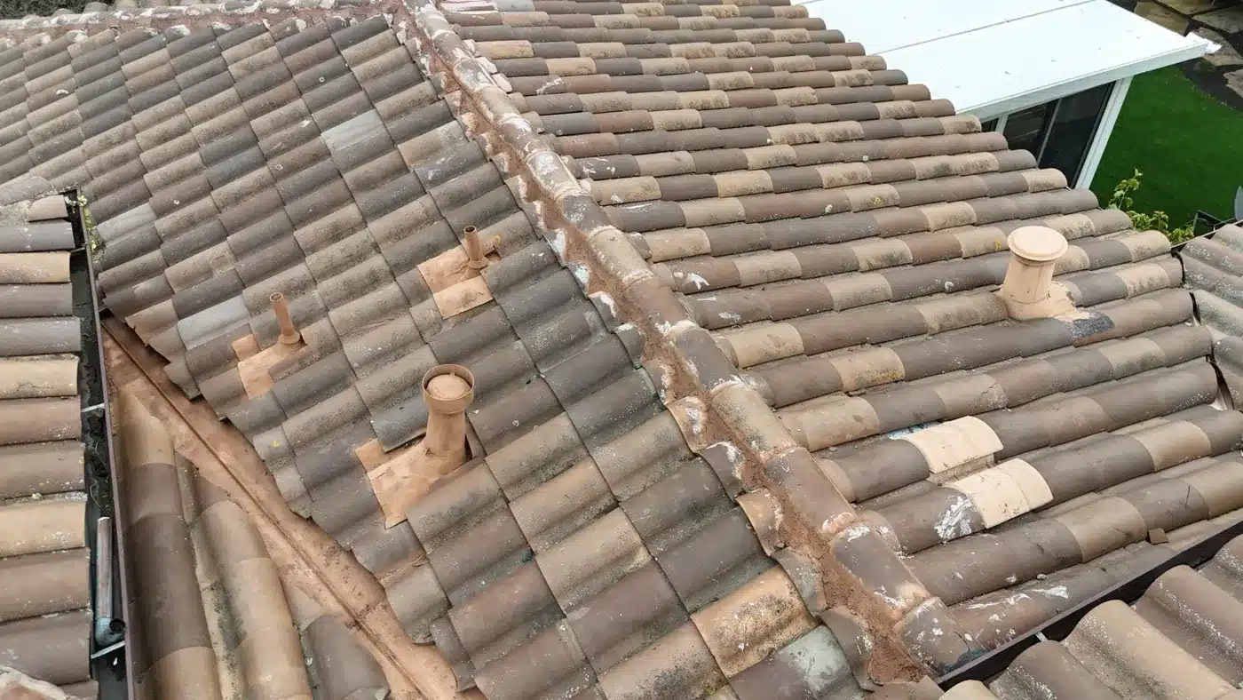 Clay tile roof in Benicia with pipe vents flashed back in and painted to match after the leak repair