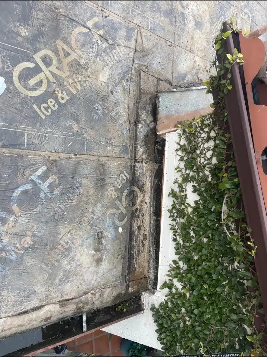Old ice and water underlayment exposed along the wall after the clay tiles were lifted in Benicia