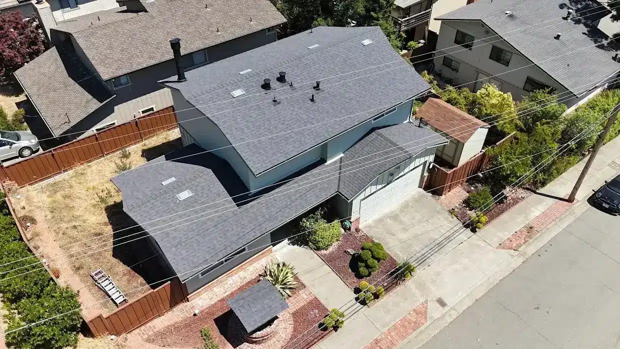 The same Castro Valley home with its new dark grey architectural shingle roof