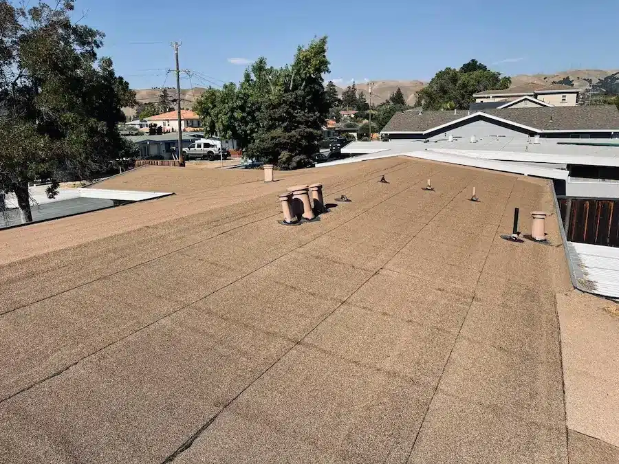 Worn, deteriorated flat roof in Fremont before Polyfresko Torch Down replacement