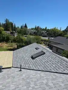 Finished gray architectural shingle roof with a new skylight on a single-story home in Pleasant Hill