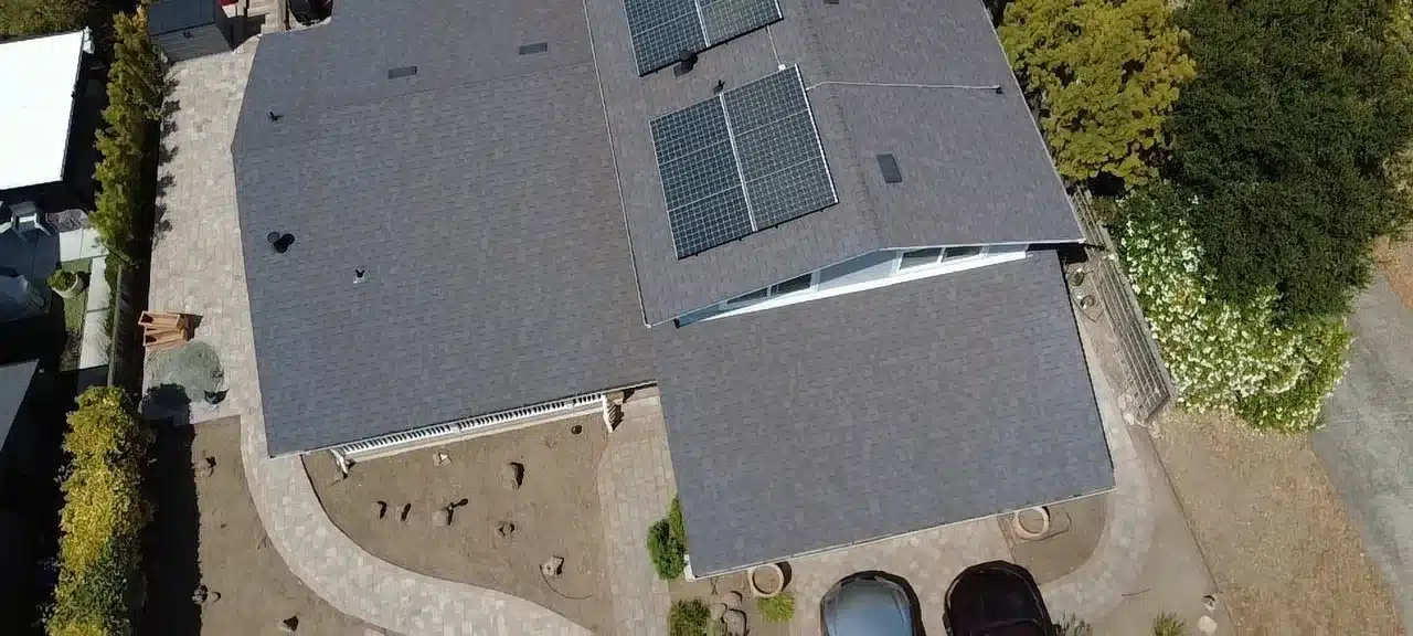 Overhead view of the finished San Rafael shingle roof with the solar array reinstalled