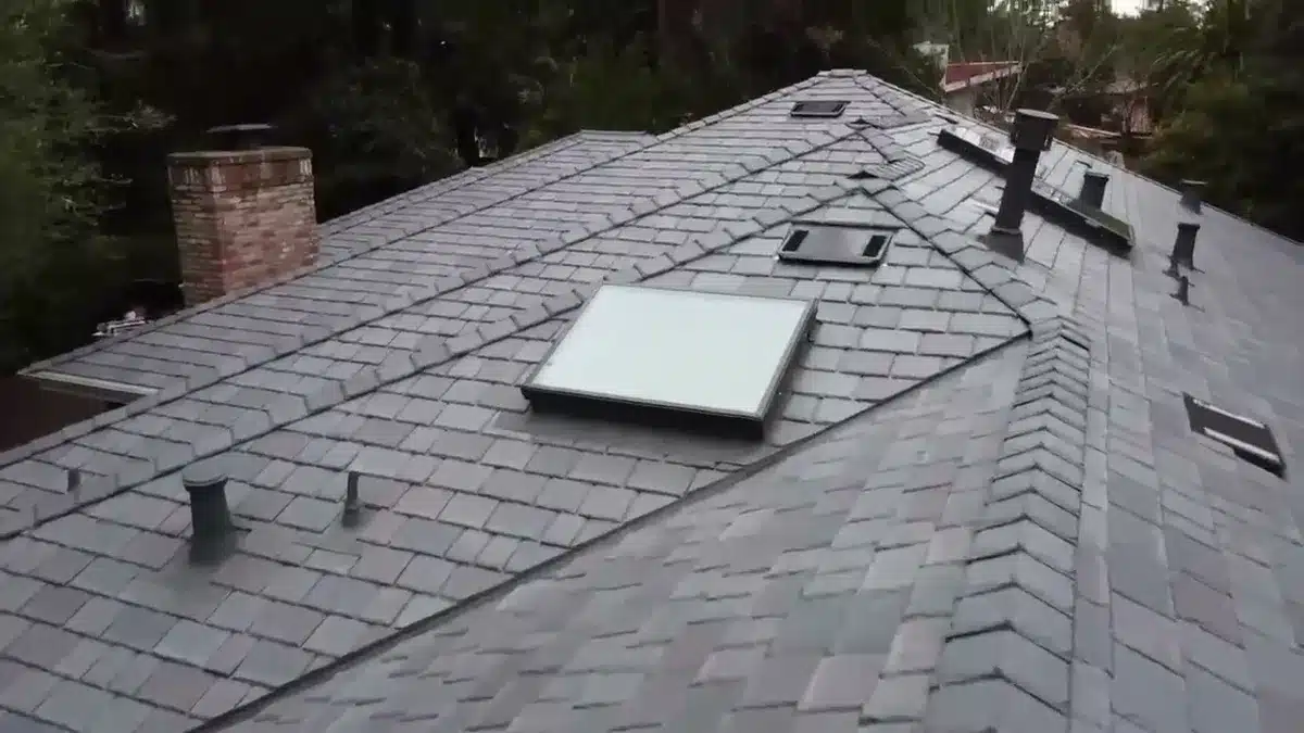 Synthetic slate roof with a new skylight and flashed vents on a Bay Area home